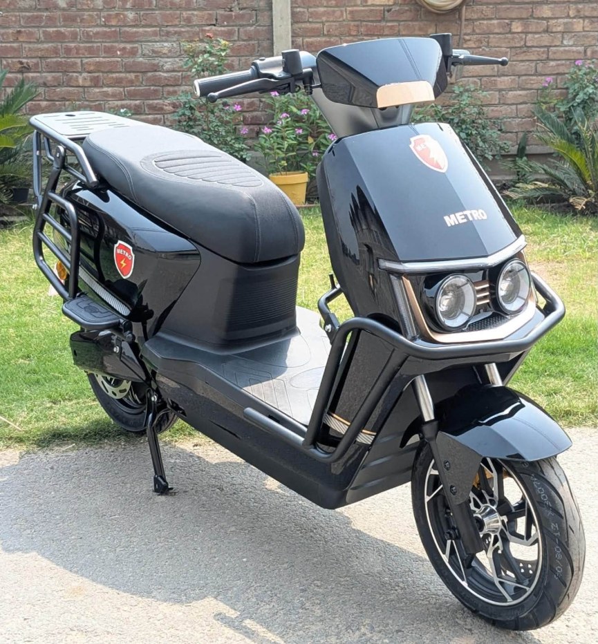 Metro Electric Bike in matte black, parked outdoors